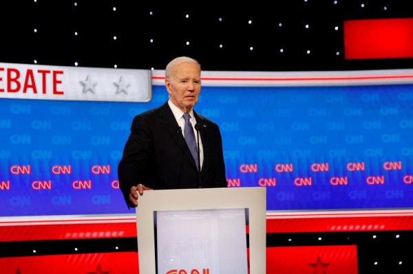U.S. President Joe Biden standing at a podium during the first 2024 presidential debate in Atlanta, Georgia
