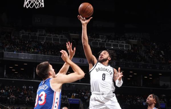 Trendon Watford puts up a floater during the Nets' preseason loss to the 76ers.