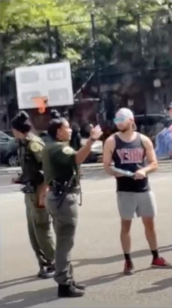 Pickleball player arguing with parks official. 