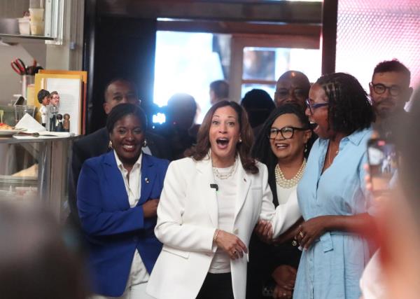 Democratic presidential nominee Vice President Kamala Harris is greeted by Mashama Bailey, co-owner of The Grey, during a visit on Thursday. 