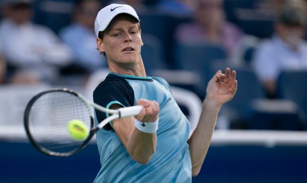 Jannik Sinner of Italy returning a shot during a match against Alexander Zverev at the Cincinnati Open