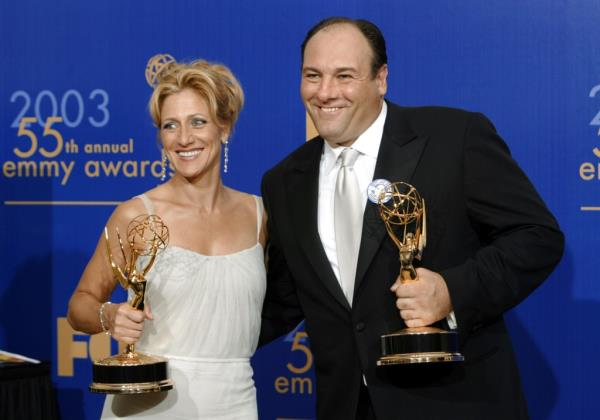 Edie Falco and James Gandolfini hold their Emmy Awards in 2003.