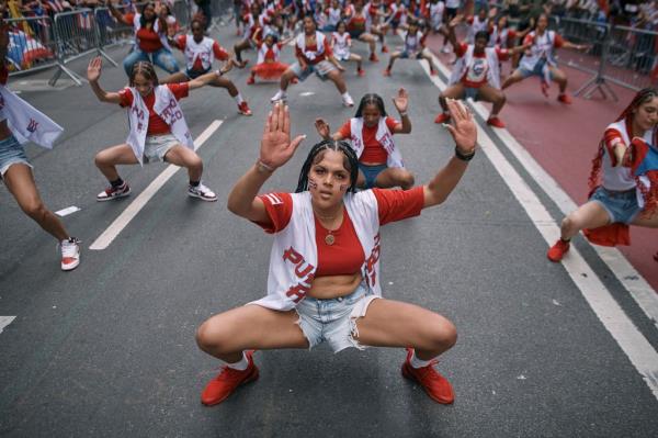 Revelers dance during the Natio<em></em>nal Puerto Rican Day Parade.