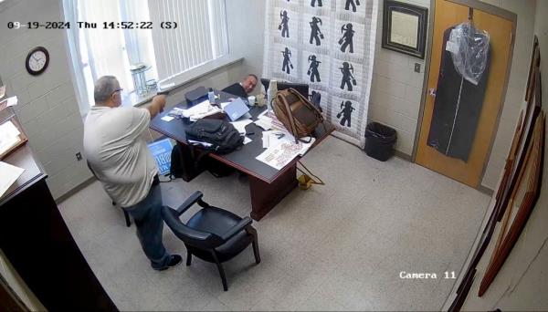 Mullins appeared to turn away and hide as Stines fired off shots.