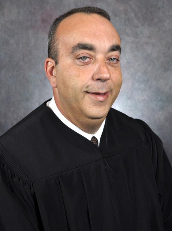 Mullins was killed in the chambers wher<em></em>e he served for 15 years.</p>
<p>