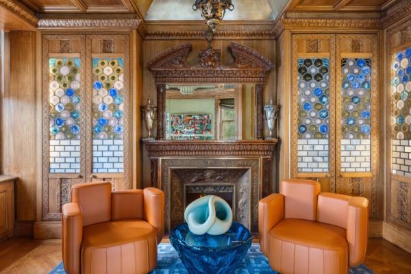 The residence boasts multiple fireplaces that warm sitting areas.
