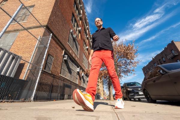 Richards walking down the street. 