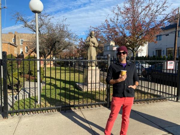 Josh Richards stands outside a church.