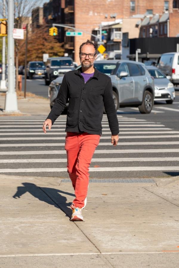 Richards walking down the street. 