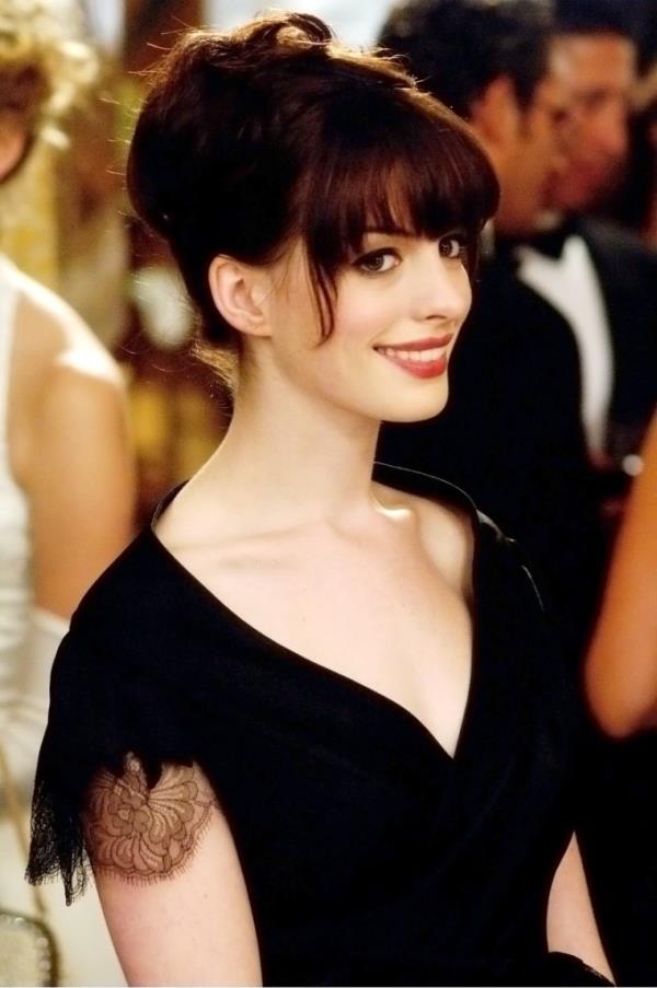 Anne Hathaway smiling. 