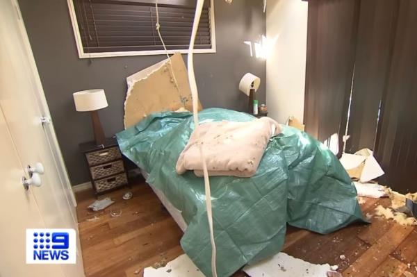 A Queensland resident's  bedroom is shown after being destroyed by the deadly storm that swept the area. 