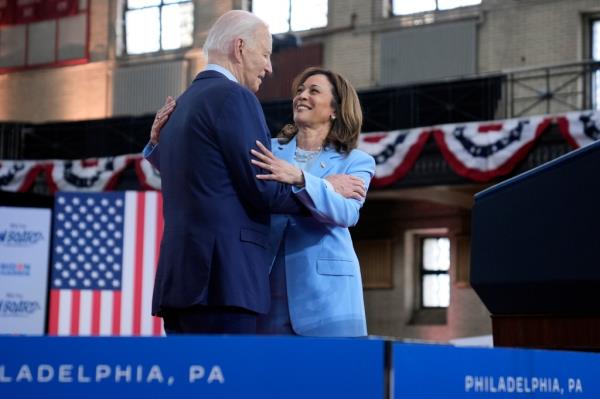 President Joe Biden hugs Vice President Kamala Harris during a campaign event at Girard College, Wednesday, May 29, 2024, in Philadelphia