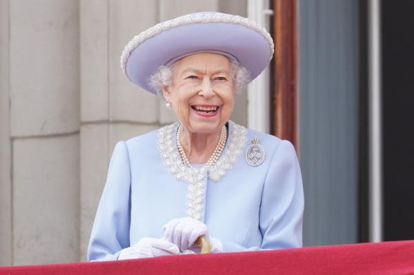Queen Elizabeth II watches from the balcony of Buckingham Palace during the Trooping the Colour parade the Trooping the Colour parade on June 2, 2022 in London