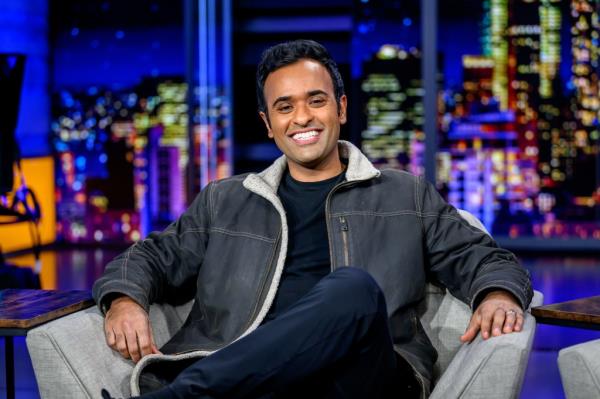Vivek Ramaswamy sitting on a couch.