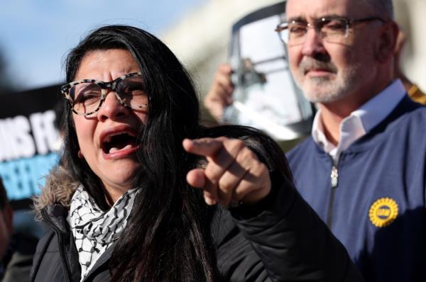 A photo of Rhasida Tlaib speaking passionately.