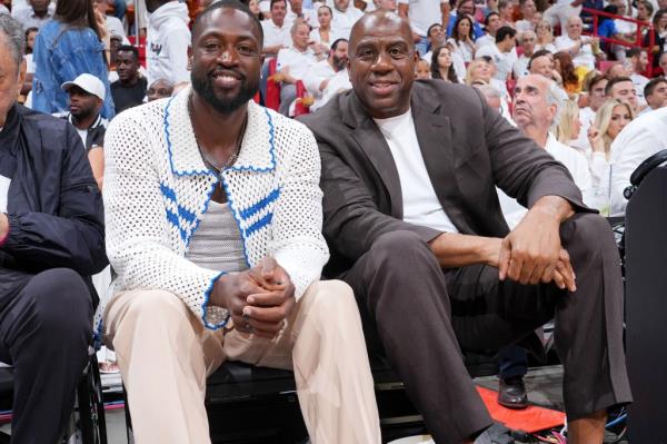 Wade and Magic Johnson attend Game 3.