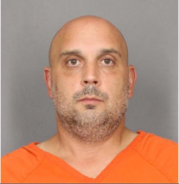 Sean Higgins, 43, from Woodstown, NJ, wearing an orange shirt, suspect of DWI