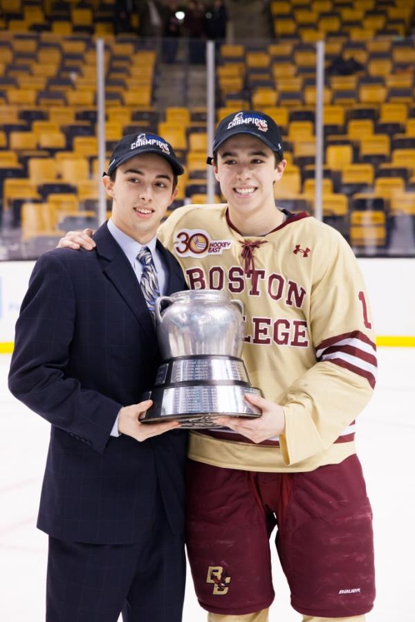 Johnny and Matthew Gaudreau celebrating with a trophy after winning the 2014 Beanpot Champio<em></em>nship for Boston College Eagles