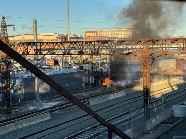 A brushfire east of New York Penn Station has knocked out power for trains in the area