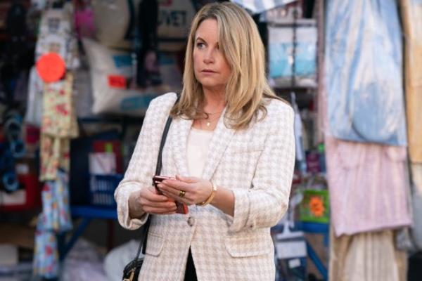 Sam in the market in EastEnders