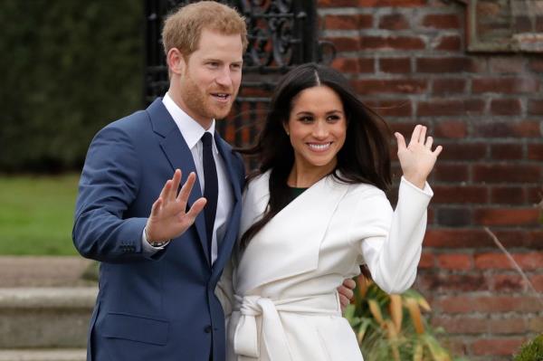 Prince Harry, Duke of Sussex and Meghan, Duchess of Sussex posing for a picture on his 40th birthday