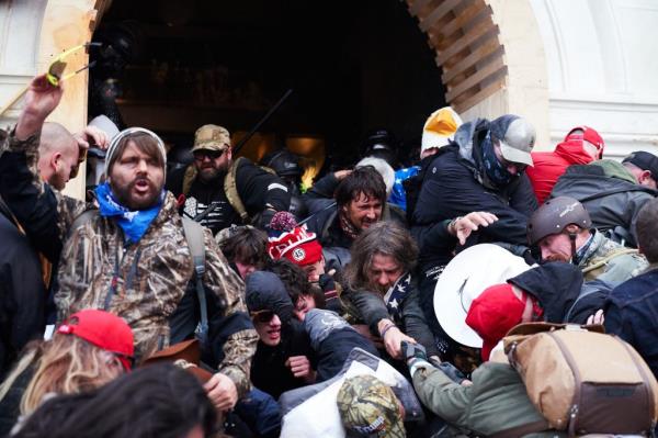 Supporters of President Do<em></em>nald Trump clash with police at the US Capitol on Wednesday, January 6, 2021 in Washington, D.C
