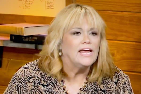 Samantha Markle in a printed shirt talking