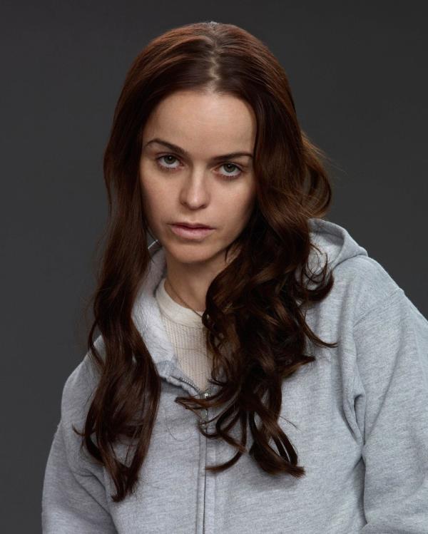 Taryn Manning looking out of it, looking at the camera. 