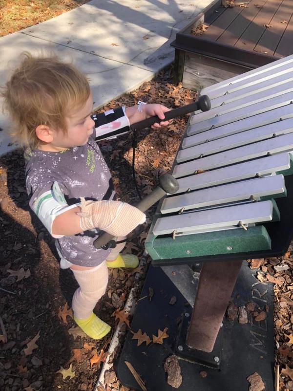 Finny playing the xylophone