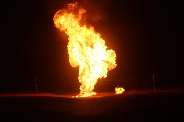 Flames leap into the air after a natural gas pipeline explodes outside the city of Boroujen in the western Chaharmahal and Bakhtiari province, Iran, in early Wednesday, Feb. 14, 2024.