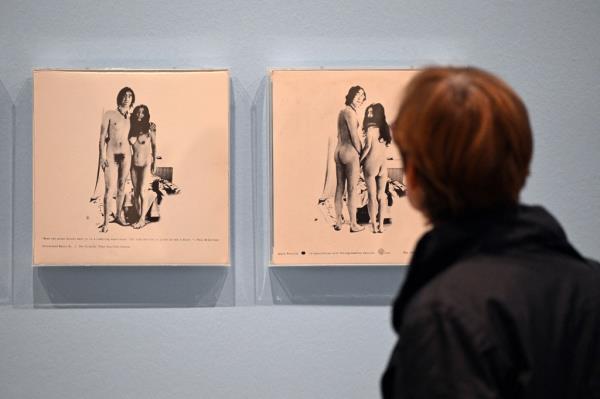 A woman looks at Yoko Ono and John Lennon's 'Unfinished Music, No.1: Two Virgins' vinyl in Germany in Sept. 2024