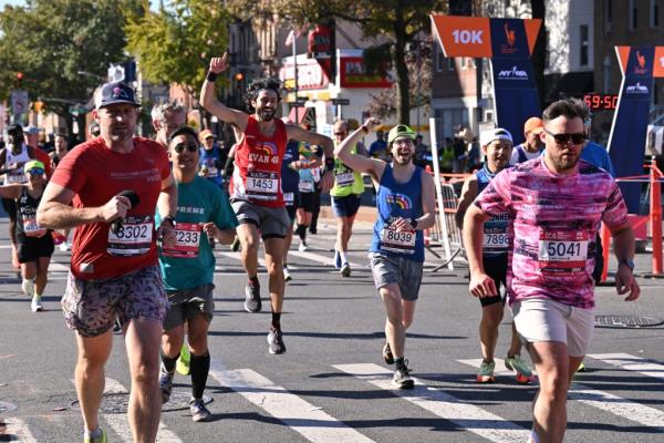 Runners along 4th Avenue in South Slope, Brooklyn.