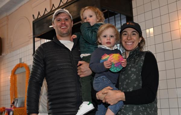 Kerry Reilly Bennett and her husband, Robert Bennett, hold their two twin sons, Francis and Robert, near Lafayette Avenue and Ashland Place in Brooklyn.
