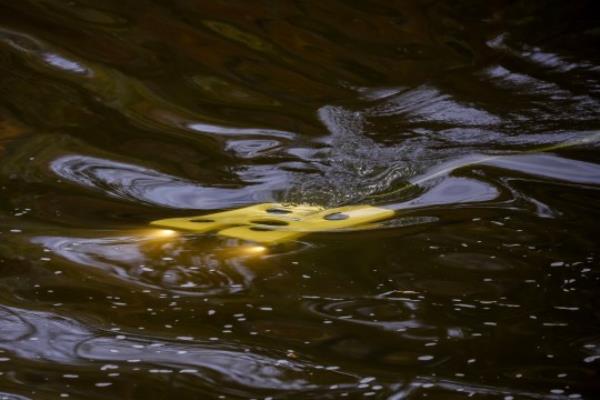 epa10943313 Law enforcement perso<em></em>nnel use an underwater robot to search the waters of the Sabattus and Androscoggin rivers, two days after a mass shooting, in Lisbon, Maine, USA, 27 October 2023. A manhunt was underway as police were searching for suspect Robert Card following a mass shooting which killed 18 and injured 13 in Lewiston, Maine, on 25 October 2023. EPA/CJ GUNTHER