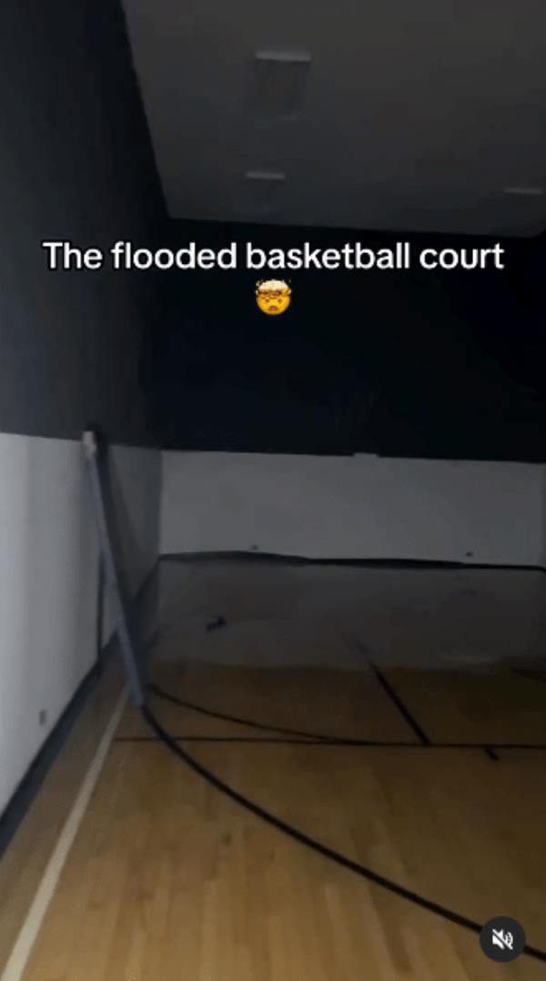 The basketball court in the house is flooded.