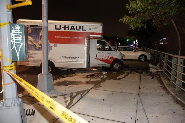 Police officers at the scene of a fatal pedestrian accident at Horrace Harding Parkway and Kissena Blvd in Queens, on August 20, 2024.