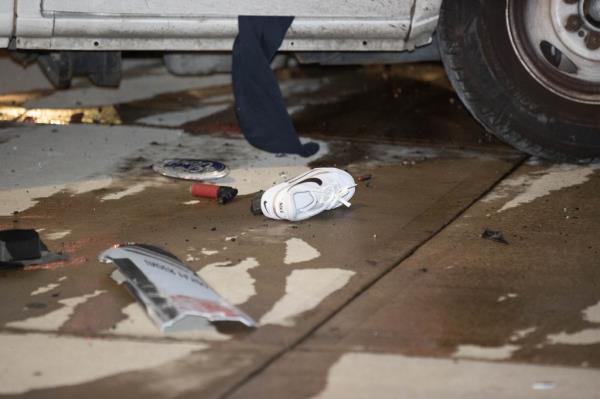 A white shoe on the ground at the scene of a fatal pedestrian accident on Horrace Harding Parkway and Kissena Blvd. in Queens, August 20, 2024.