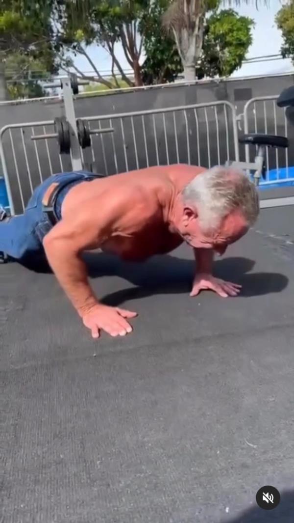 RFK Jr. doing shirtless pushups.