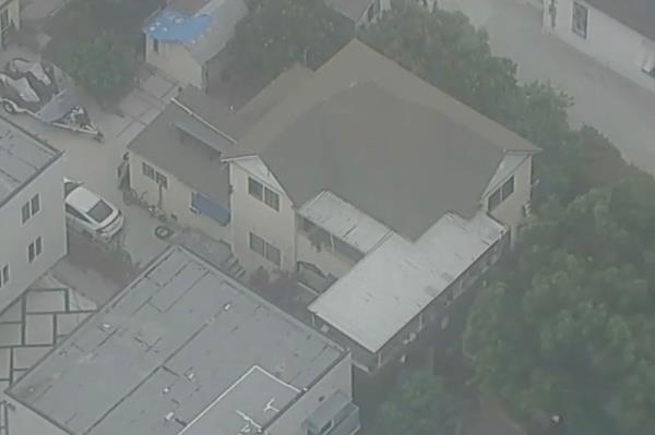 Aerial image of the home in South Los Angeles wher<em></em>e a woman's body wrapped in plastic was found. 