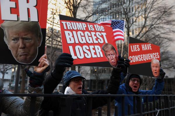Demo<em></em>nstrators protested against Trump during his hush mo<em></em>ney trial in New York.
