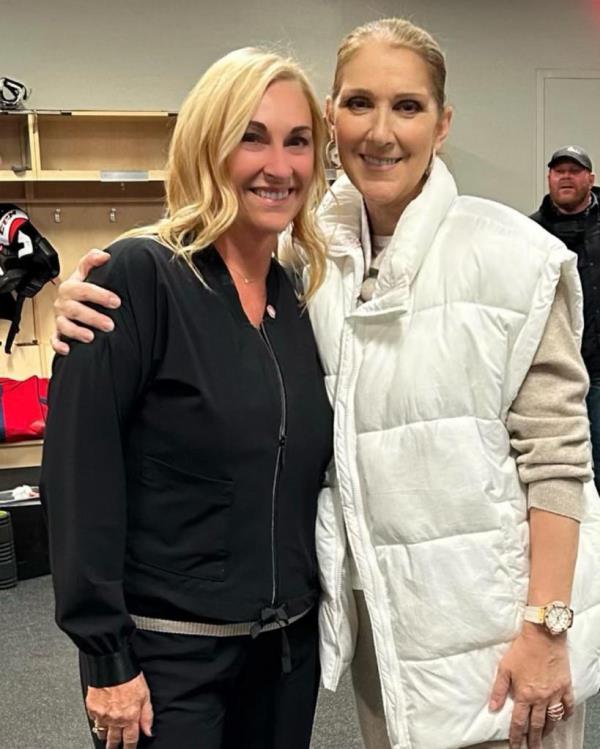 Celine Dion smiling with Chantal Machabee. 