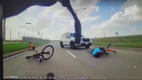 Car running over cyclist