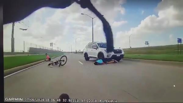 Car running over cyclist