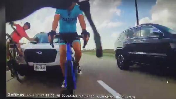 Car running over cyclist