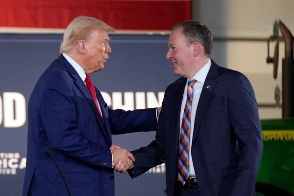 Do<em></em>nald Trump greets Lee Zeldin as he arrives to speak at a campaign event at a farm, Monday, Sept. 23, 2024, in Smithton, Pa.