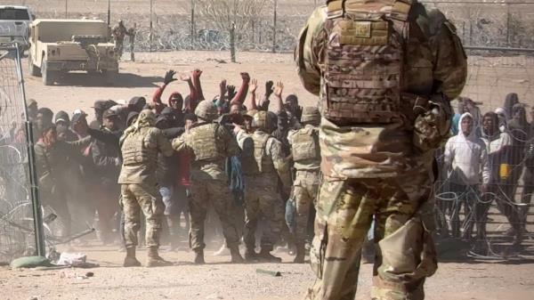 Migrants battle Texas soldiers at the border in El Paso on March 21