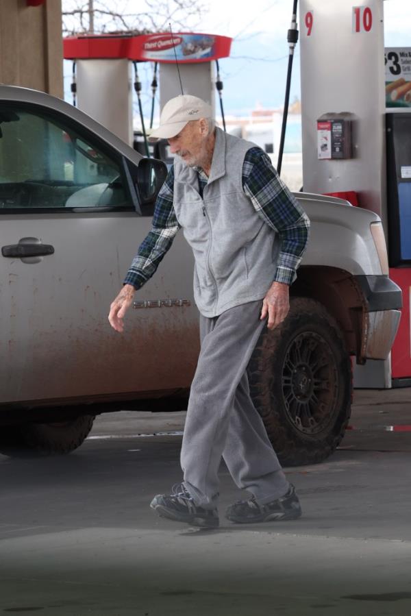 Gene Hackman walking. 