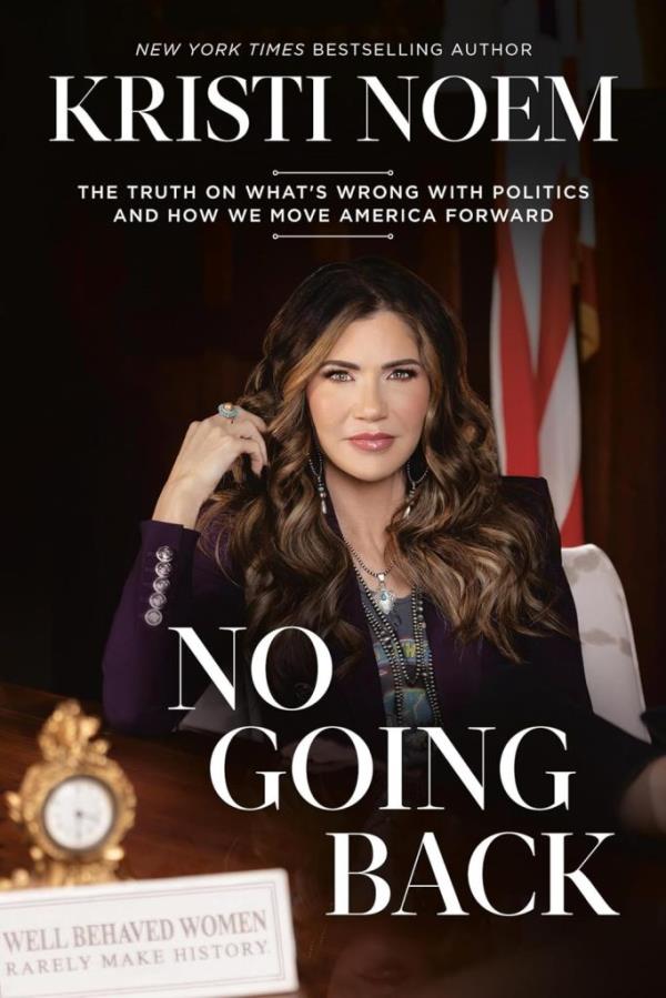 The cover of Noem's book shows her with wavey dark hair as she stares into the lens