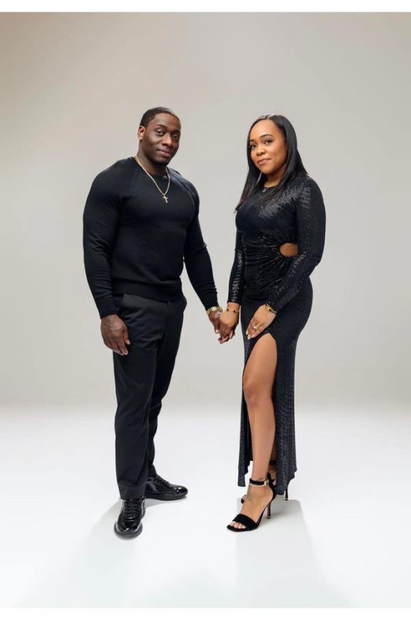 Kirk Walker and Shauntea Weaver holding hands in undated photo