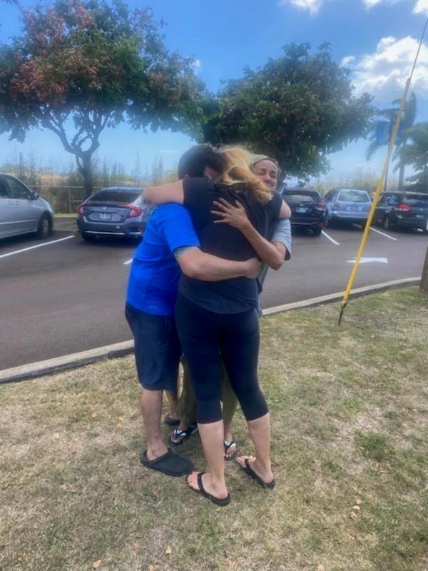 Cicchino embracing his wife and mom